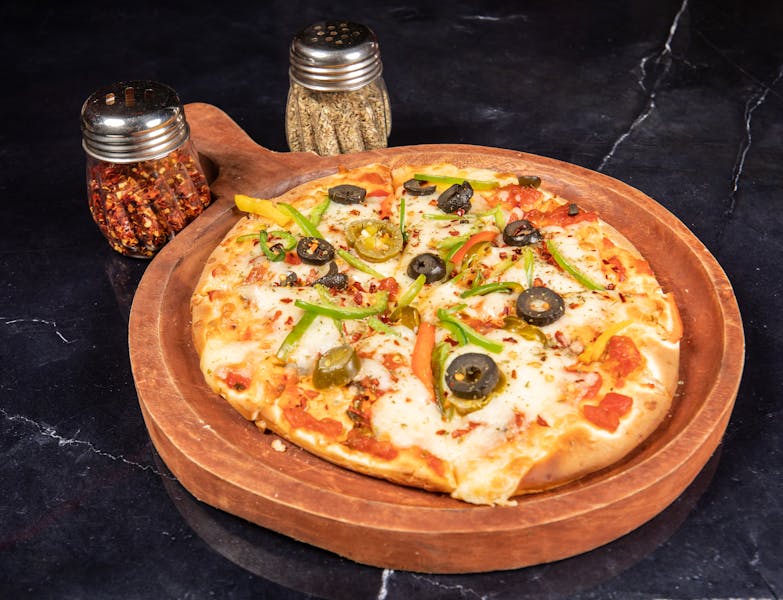 Via 313 pizza with roasted vegetables and mozzarella